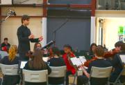Sam conducting